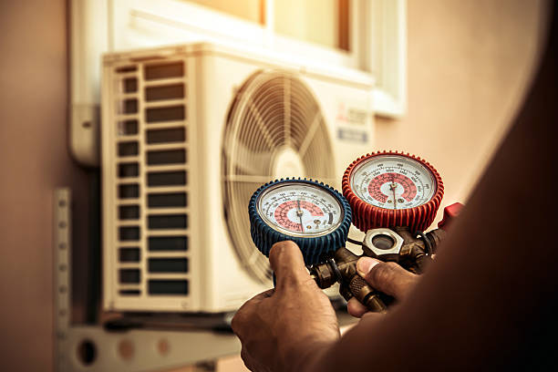 Professional Heat Pump Repair technician working in Mount Saint Francis, IN